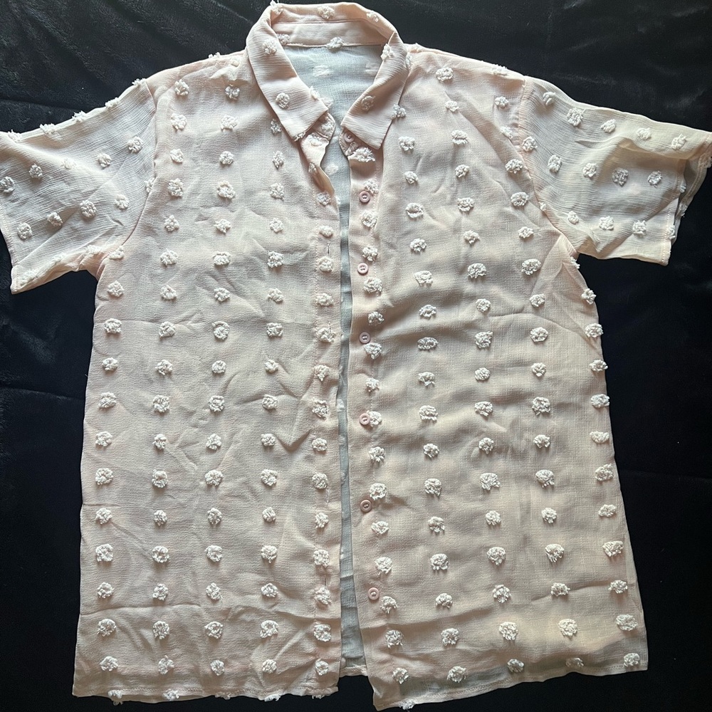 A light/baby pink button down with a cute print